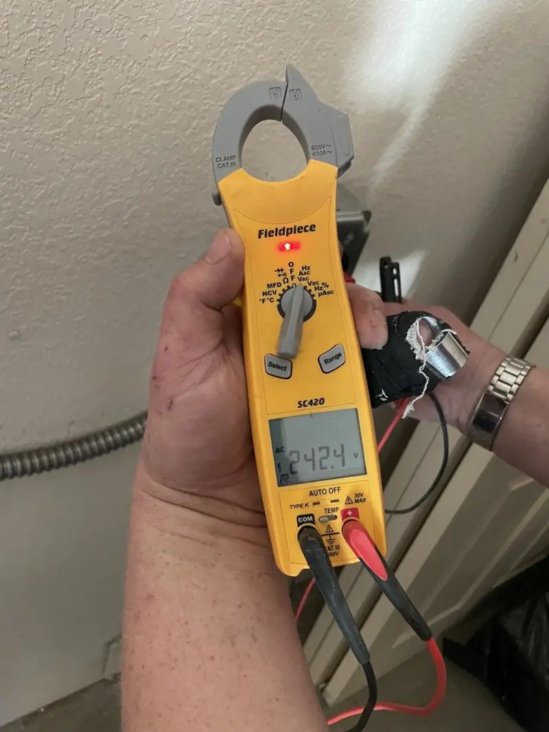 Voltage testing with clamp meter during Outlet Installation in Bethlehem